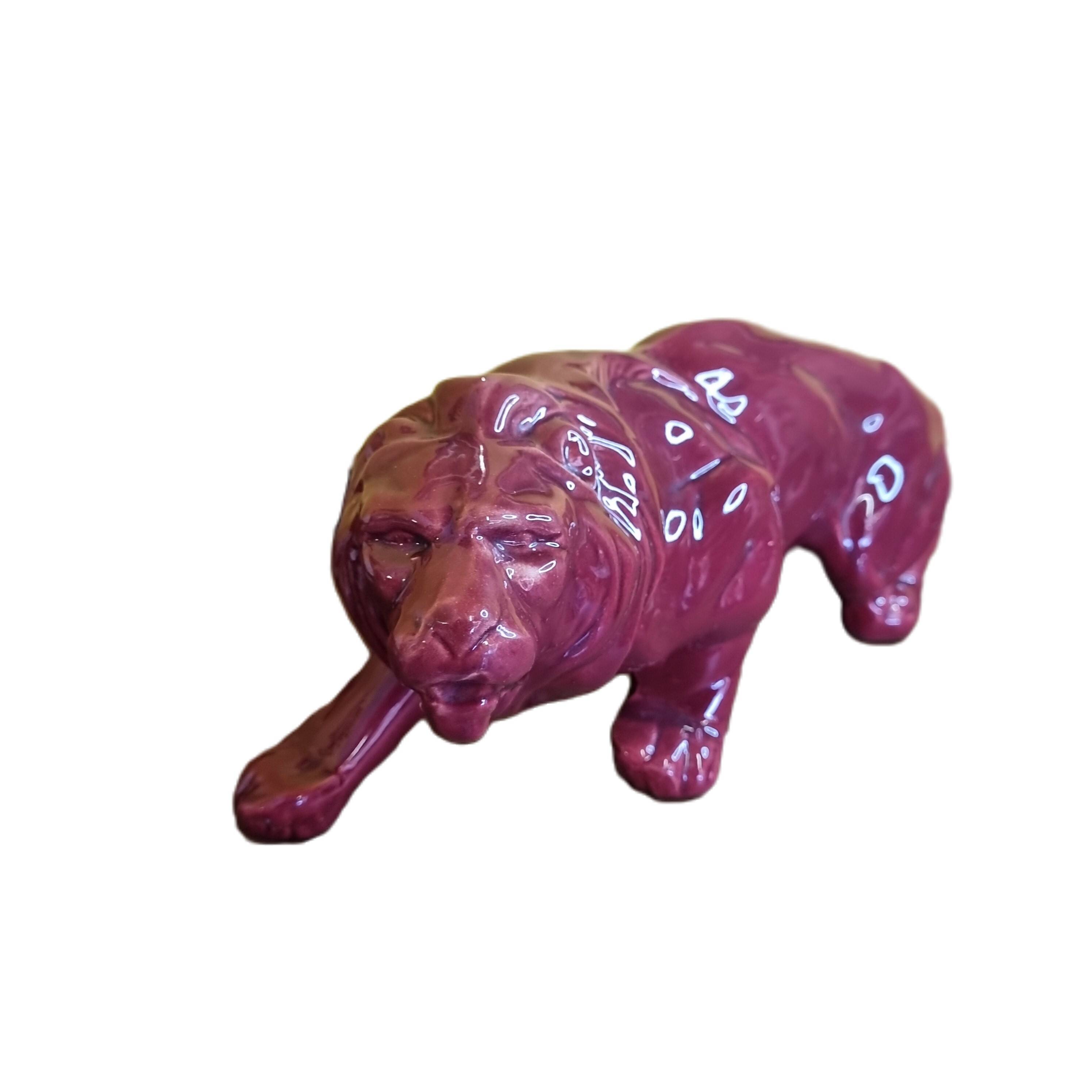 French Art Deco red glazed Ceramic Statue Of A Lion, 1930s