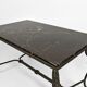 Coffee table in patinated wrought iron and black marble, circa 1940