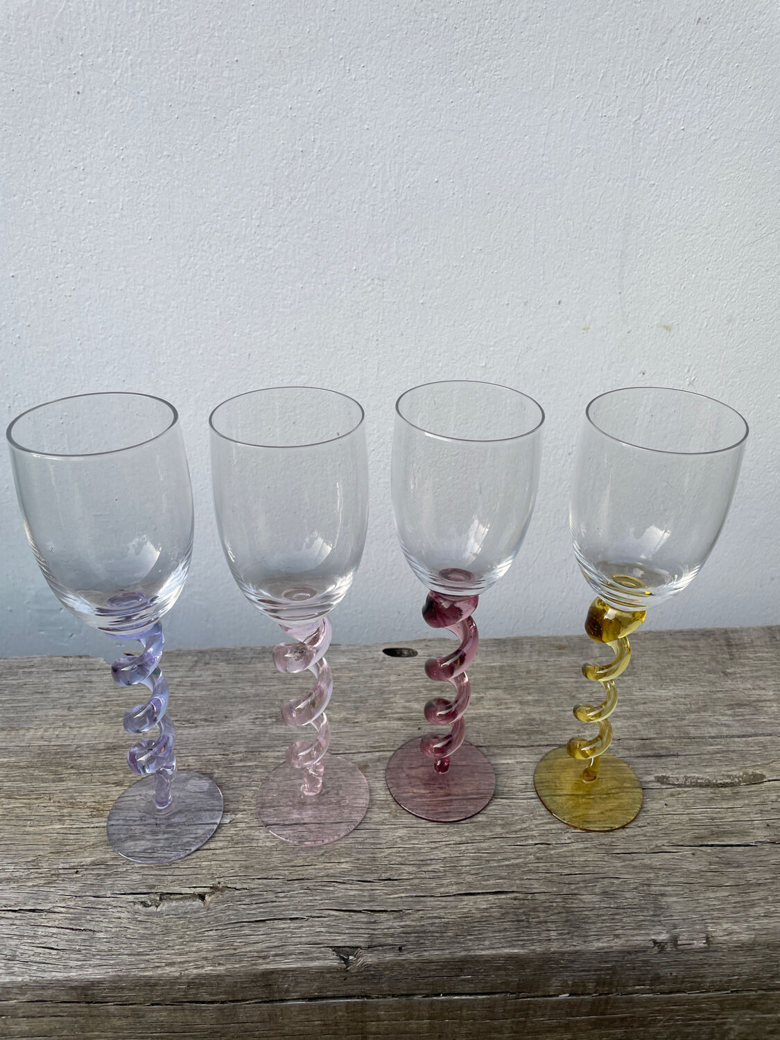 4 large, multicoloured, twisted champagne flutes