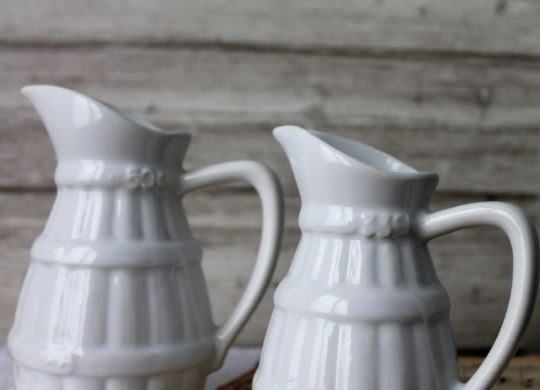 2 old french pitchers in white ceramic, circa 1960