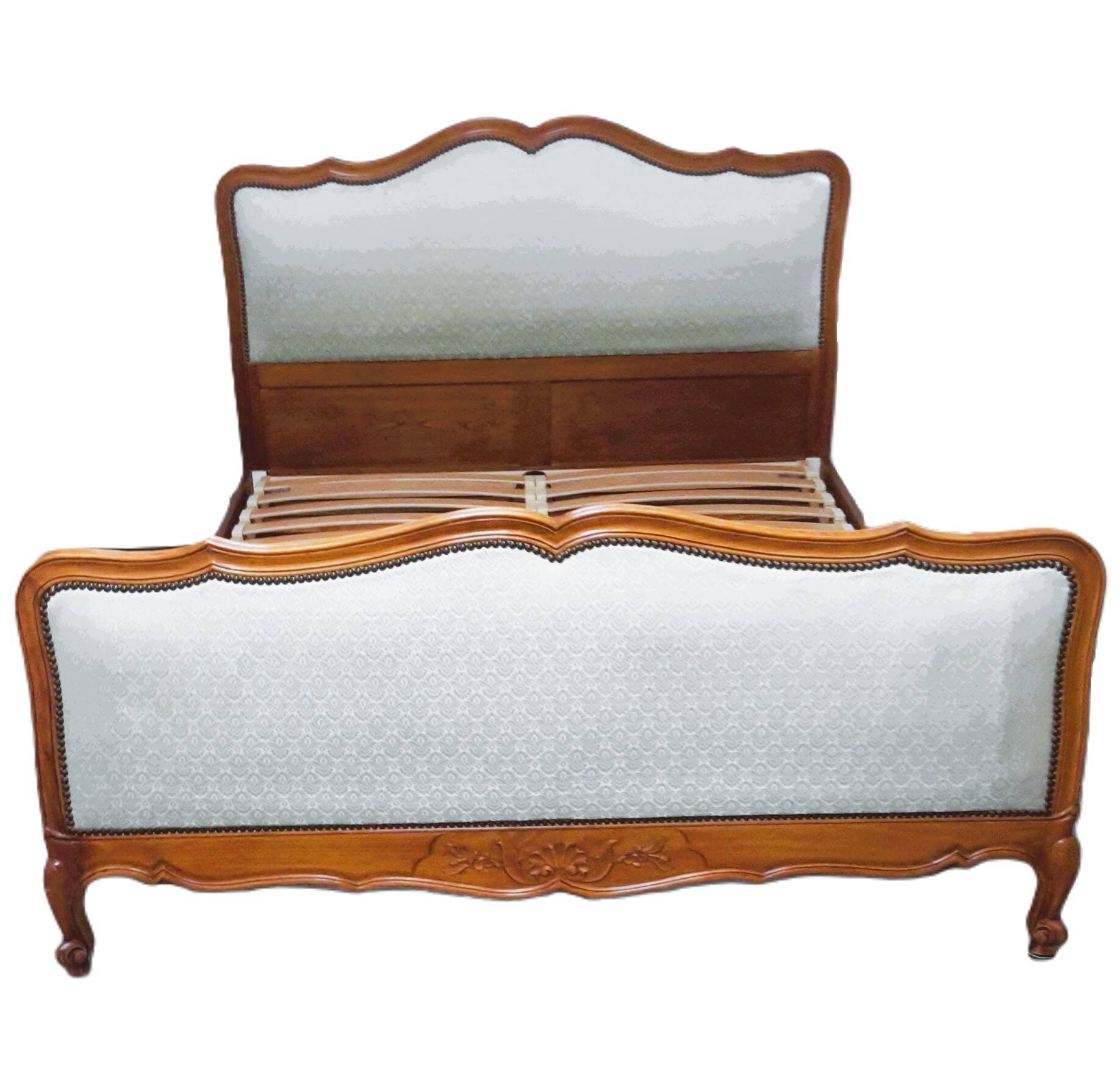Cabinetmaker's bed frame and matching upholstered bedspread