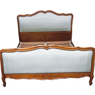 Cabinetmaker's bed frame and matching upholstered bedspread