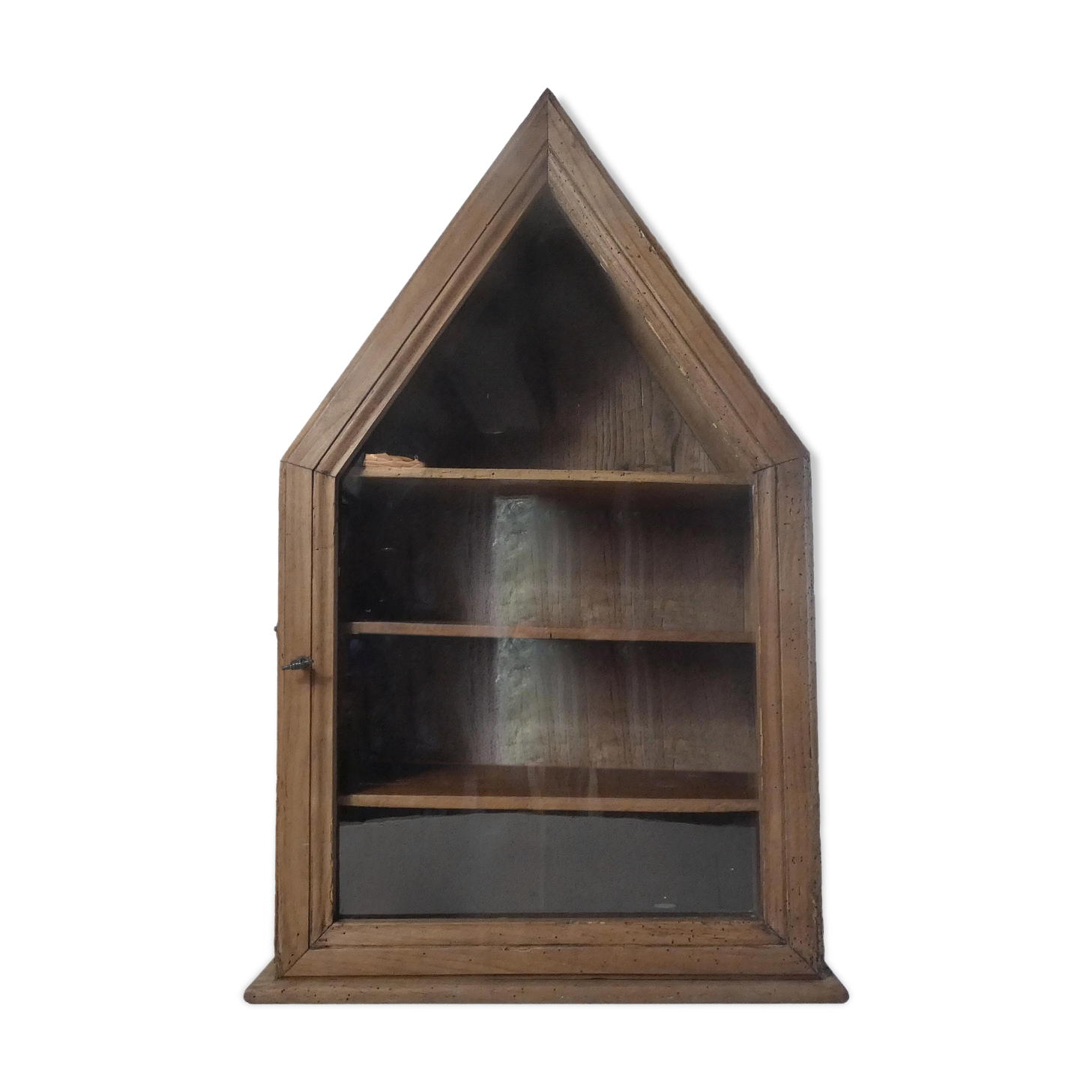 Old niche shelf with glazed statue