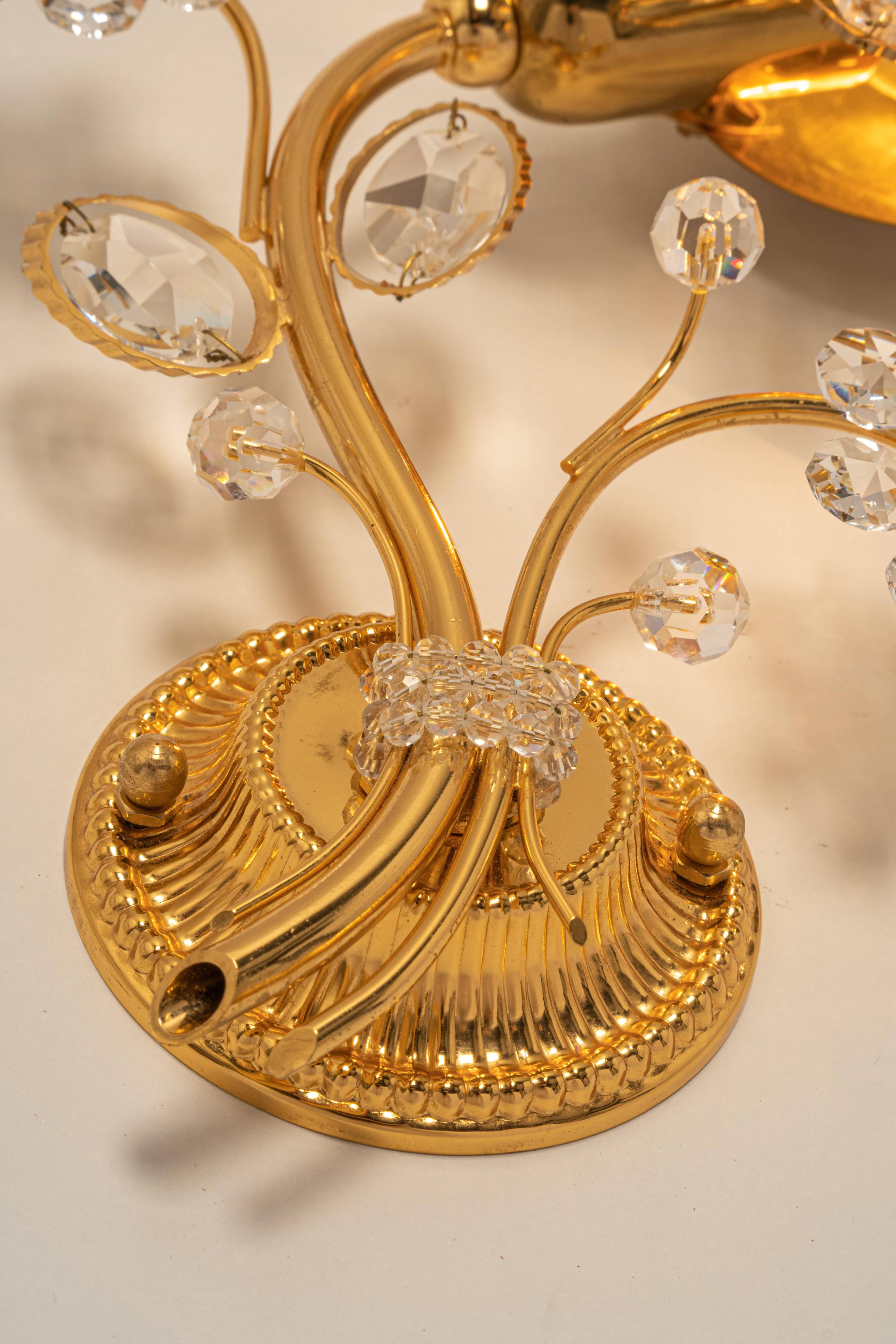 Sconce in gilded brass in the shape of a flower by Palwa, Germany, 1970s.
