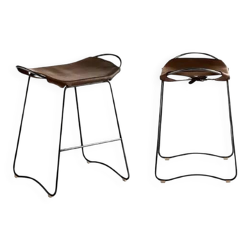 Pair of Hug stools without a backrest in brown and black steel.