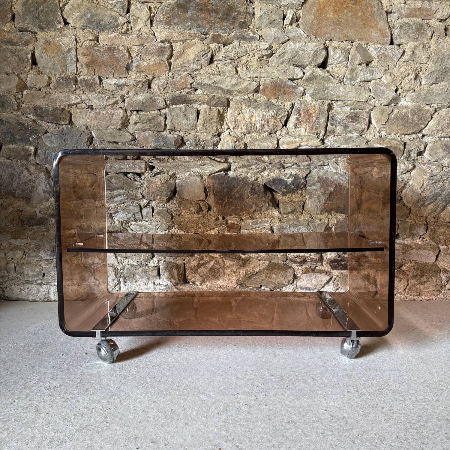 Smoked Plexiglas coffee table by Michel Dumas for Roche Bobois, 1970.