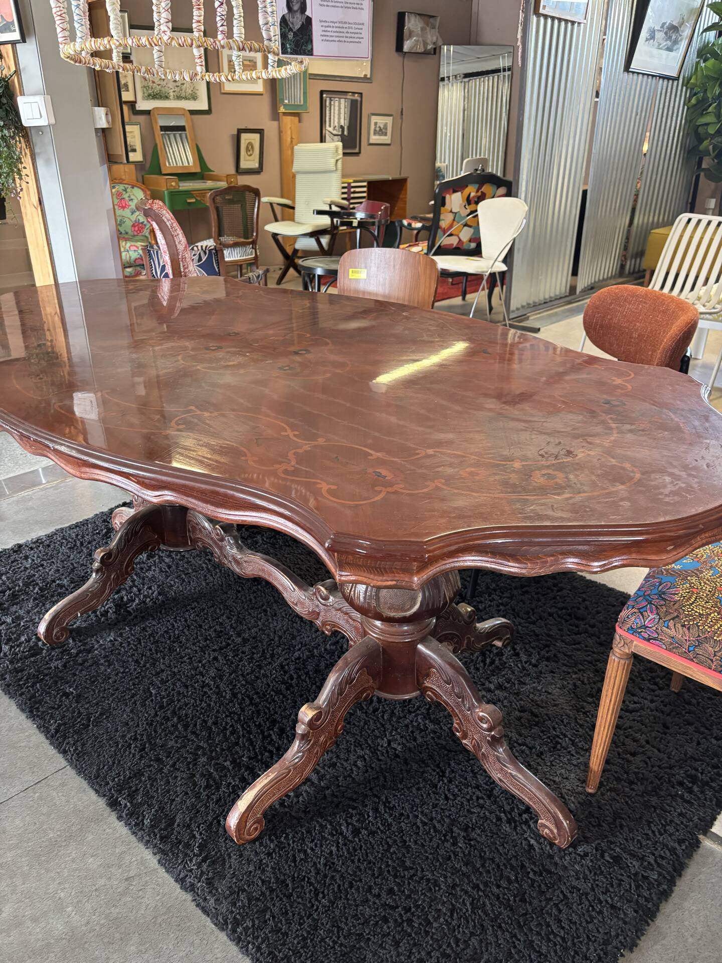 Oval table with marquetry top