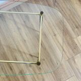 Coffee table from the 50s/60s, glass, brass, black metal.