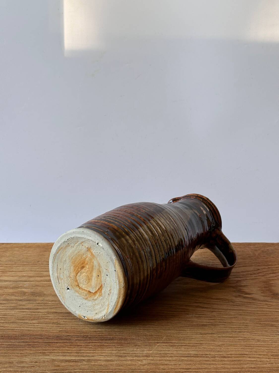 Vintage enameled stoneware pitcher