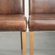 Vintage set of 4 dining chairs made of sheepskin leather with a high back