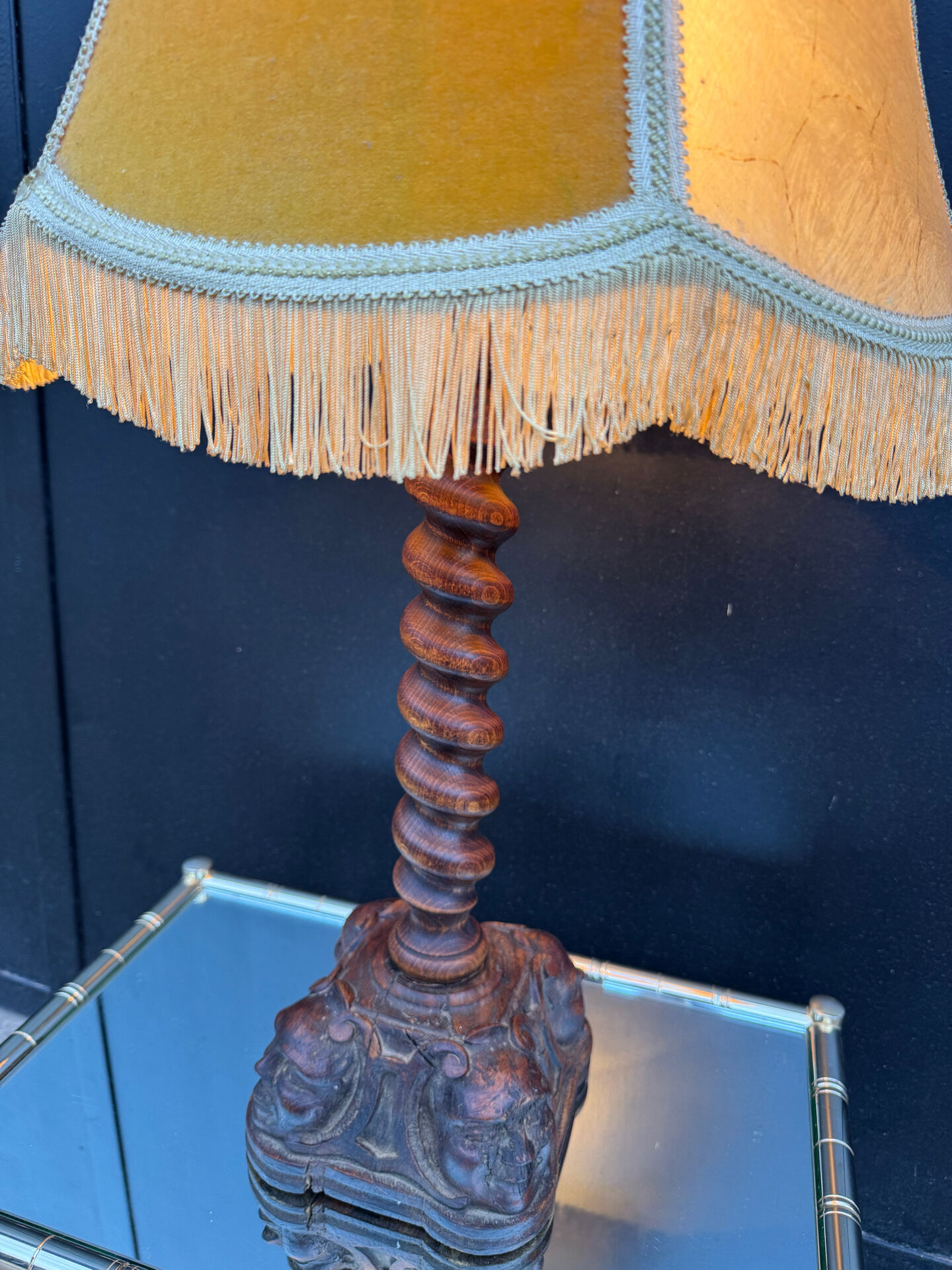 Sculpted wooden lamp with faces, antique.