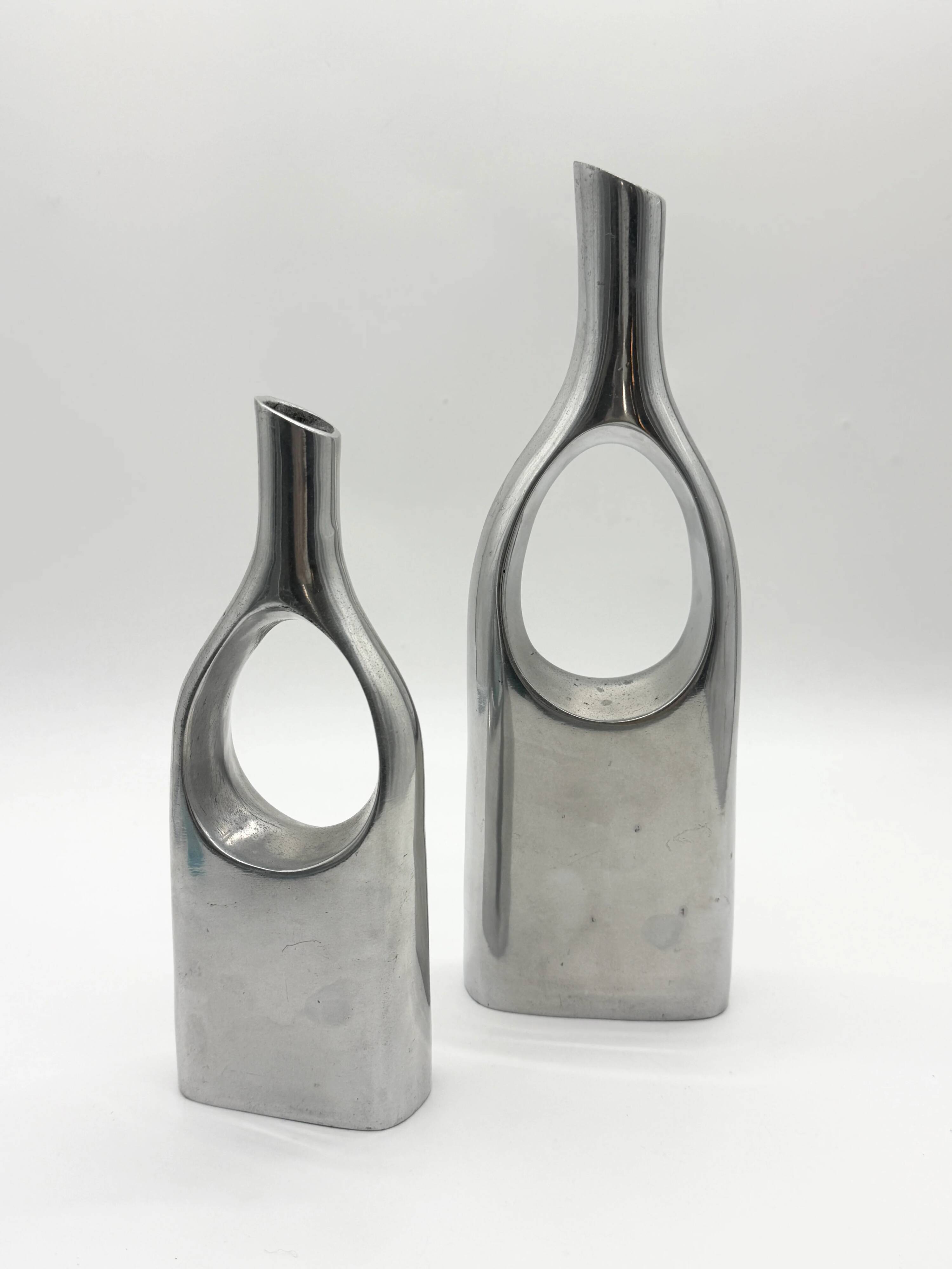 Pair of "drop" vases in aluminium cast, Italy, 1970s