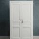 Antique Parisian wardrobe in white wood with shelves from the 1950s.