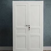 Antique Parisian wardrobe in white wood with shelves from the 1950s.
