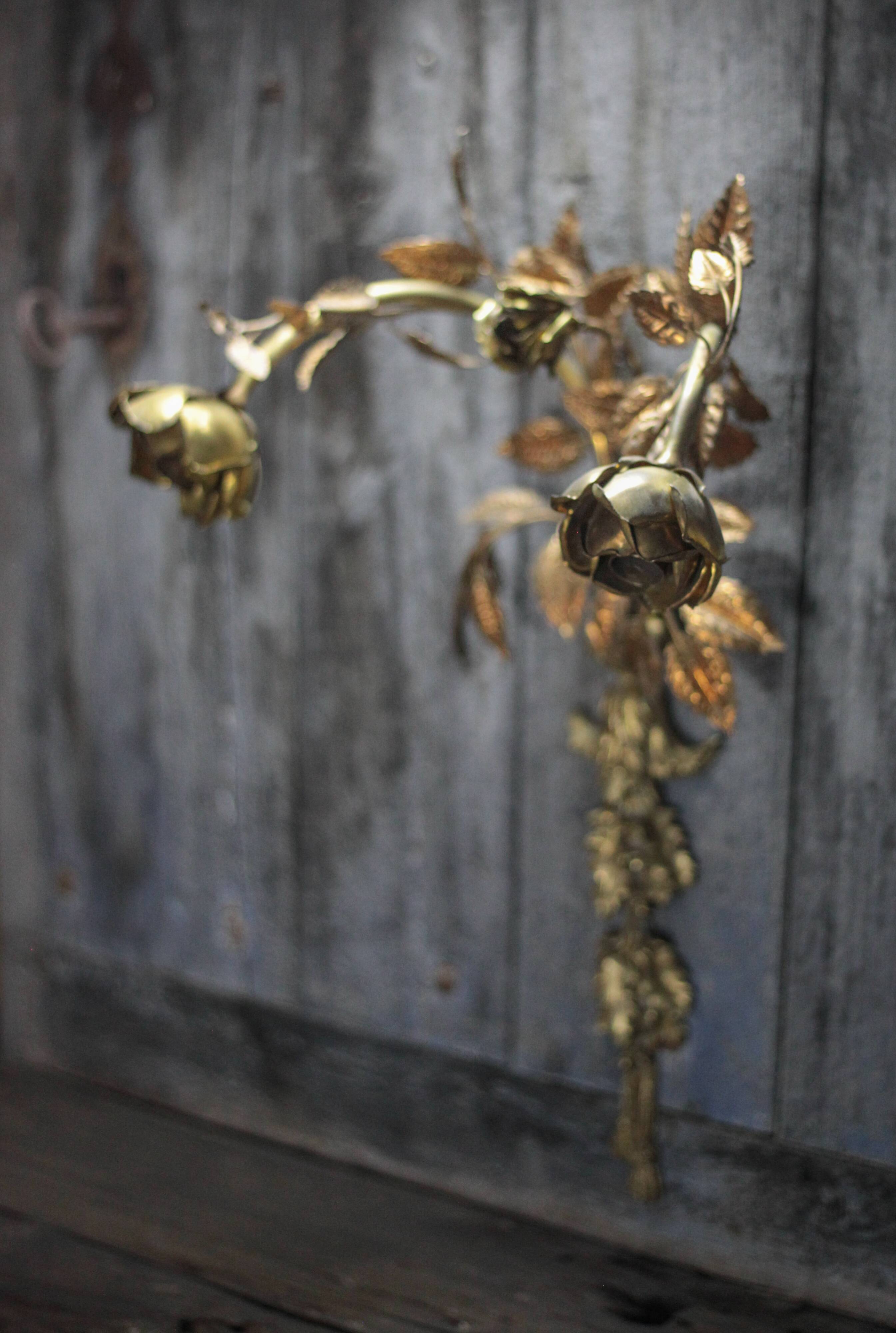 Pair of bronze and gold metal floral wall sconces, flower wall lamp.