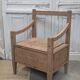 Antique armchair in raw wood