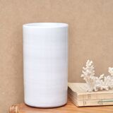 Vase by Antonio Lampecco minimalist white ceramic scroll