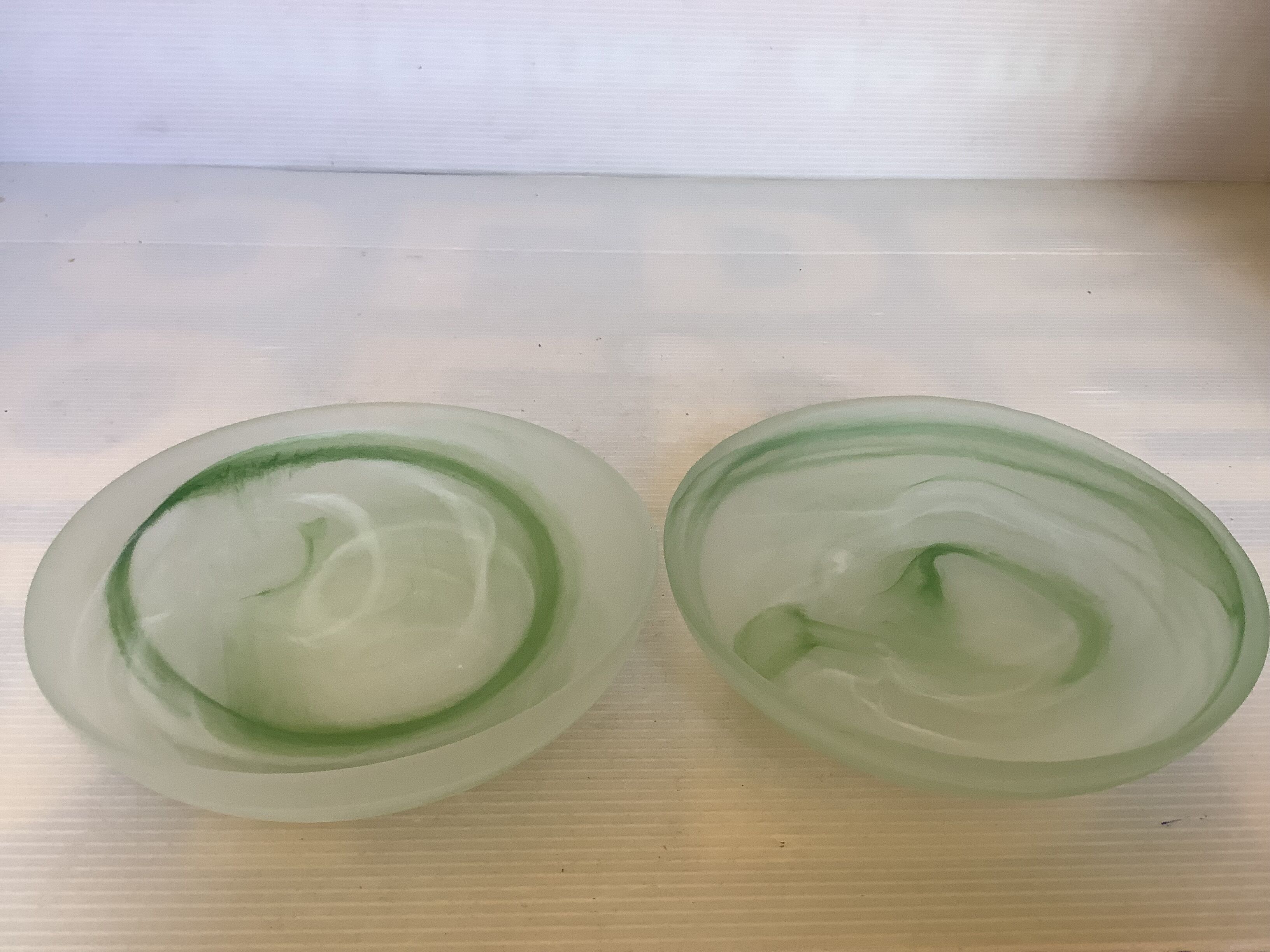 Pair of green glass paste pocket trays