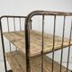 Vintage industrial iron and wood shelves on wheels