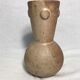 Former brown ceramic vase