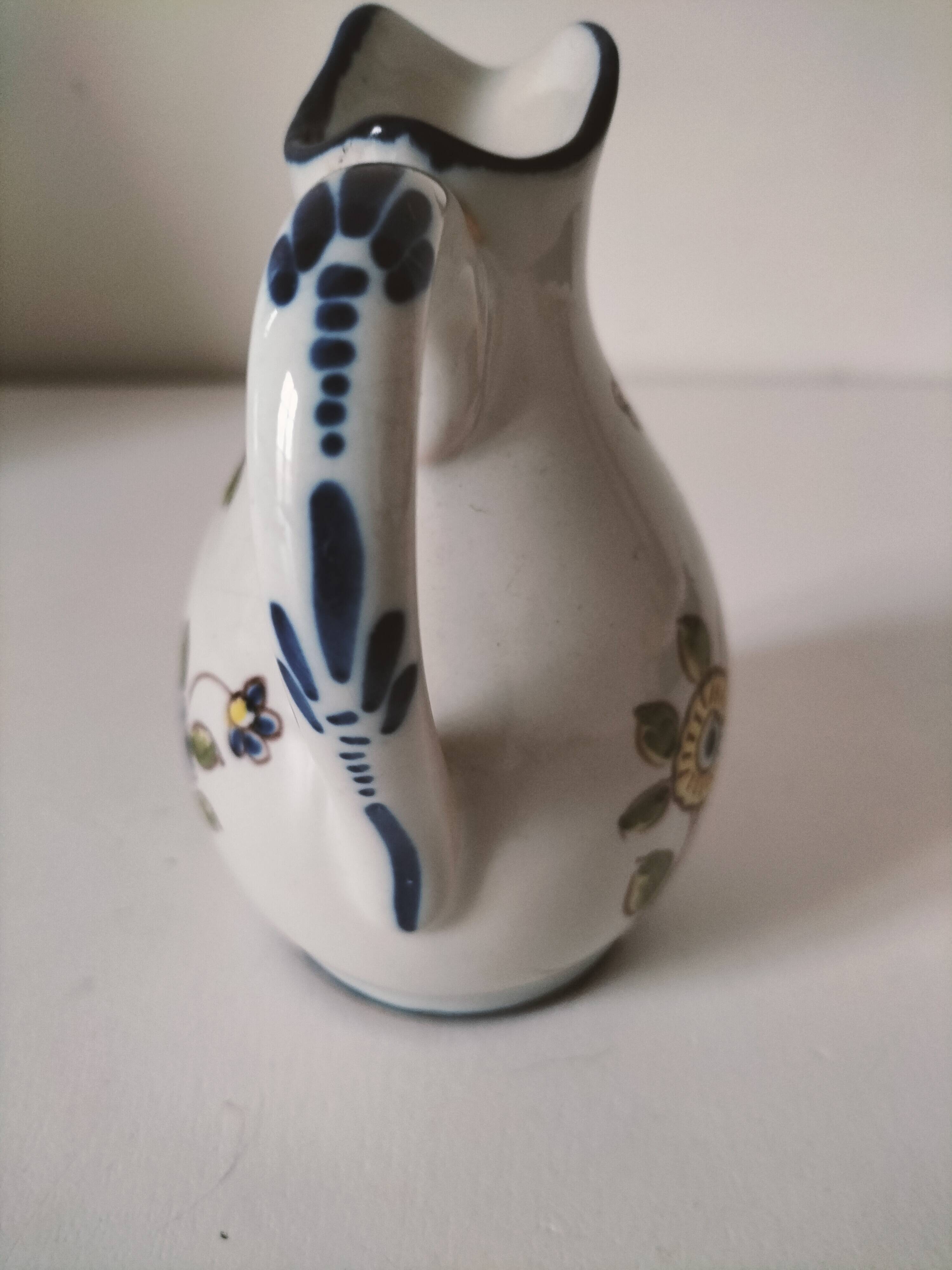 Small Malicorne pitcher with hand-painted floral decoration