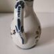 Small Malicorne pitcher with hand-painted floral decoration