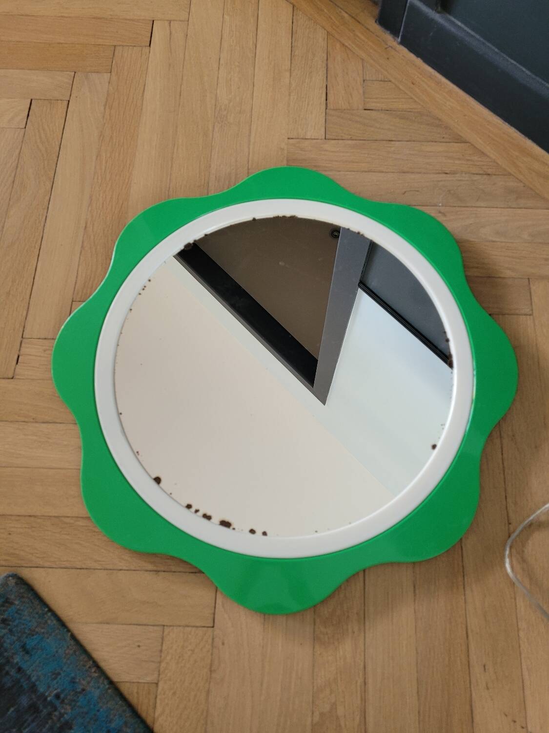 Plastic flower mirror by Finnish designer Makisen Kuvastin