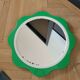 Plastic flower mirror by Finnish designer Makisen Kuvastin