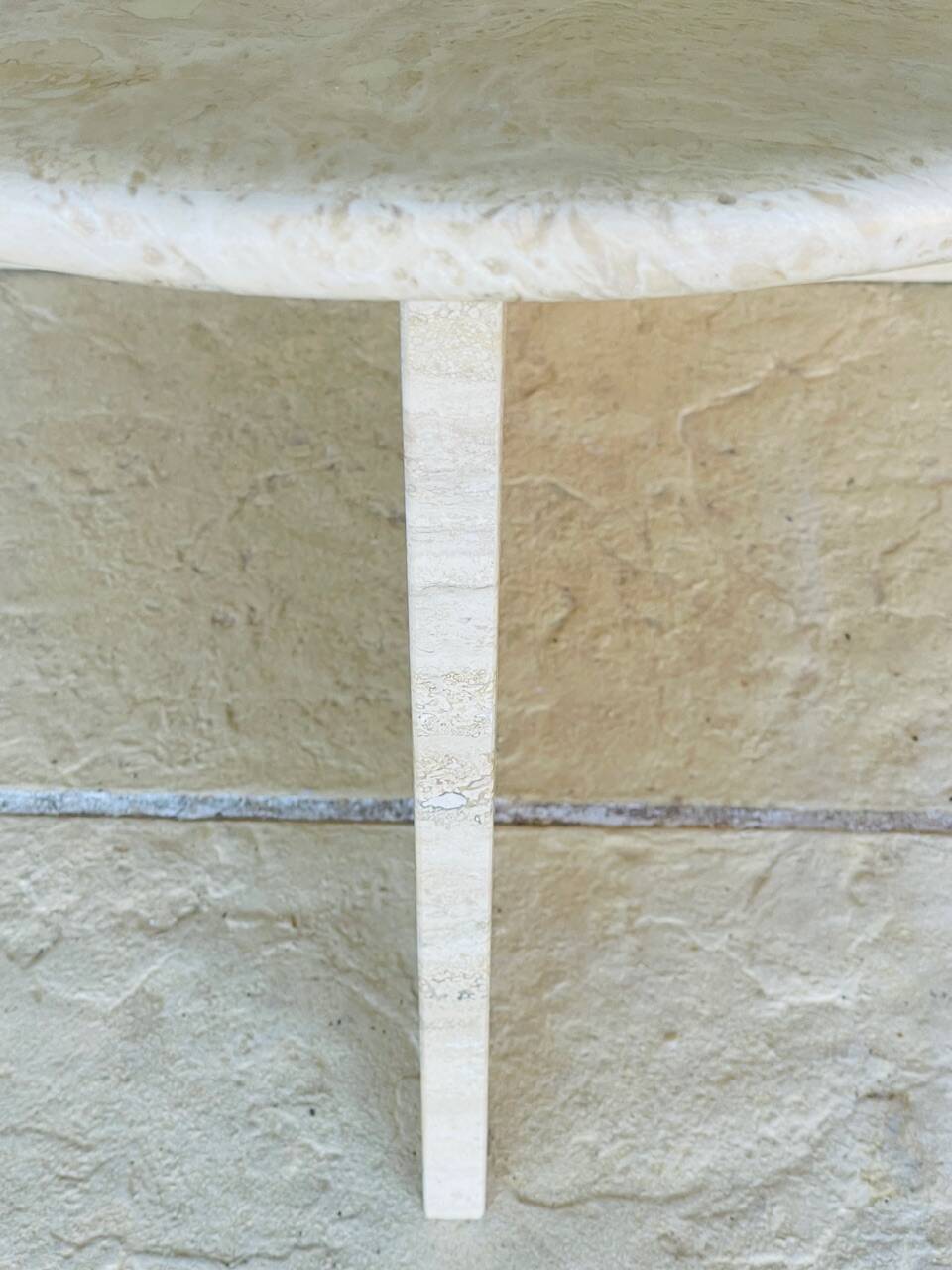 Vintage side table in travertine, circa 1980s.