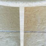 Vintage side table in travertine, circa 1980s.