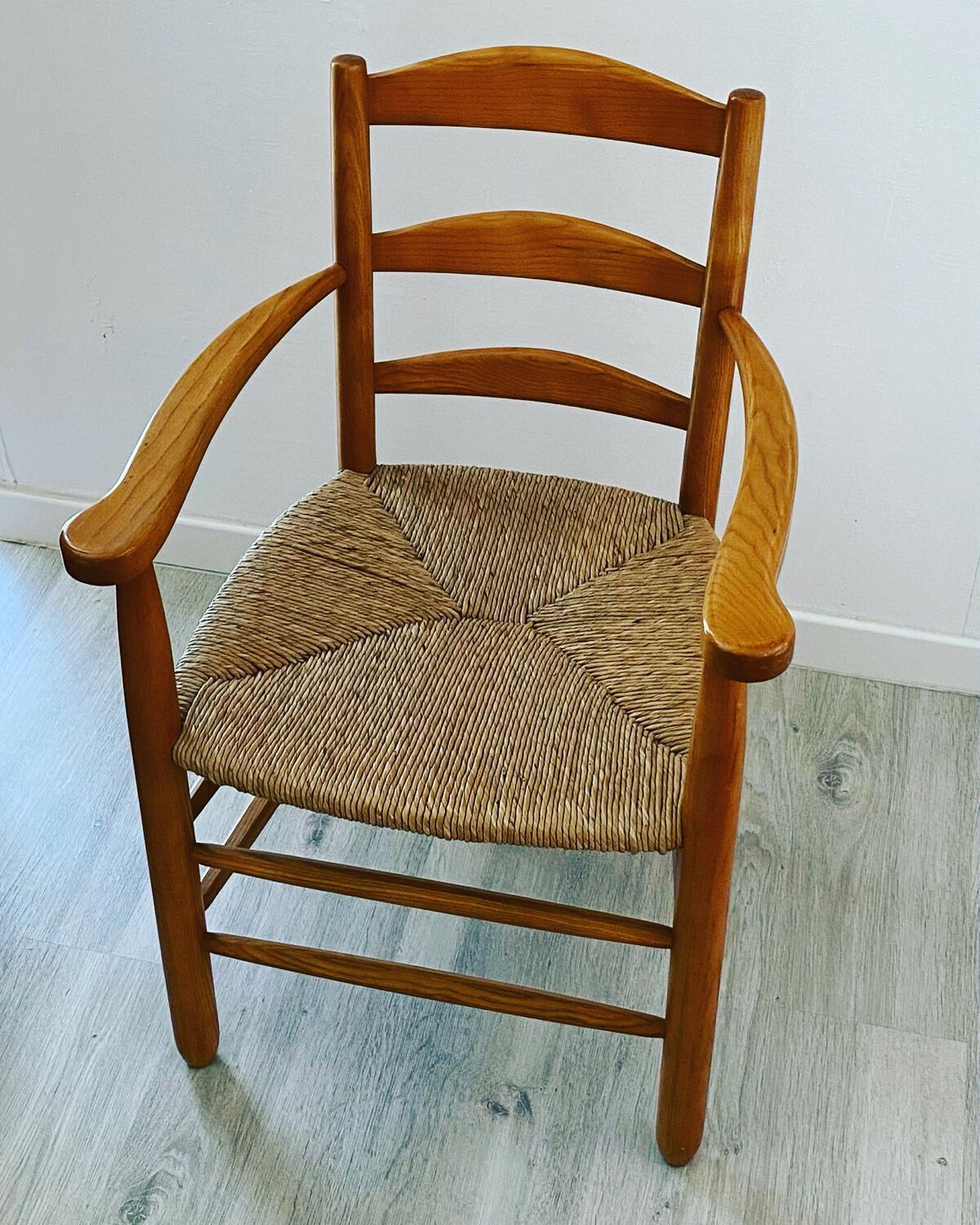 Wooden and straw armchair