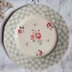 Old flat plates mismatched in earthenware