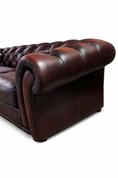 Brown tufted English Chesterfield leather sofa