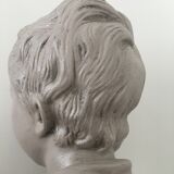 Cherub bust in platter