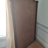 Hazed and carved wooden mirror