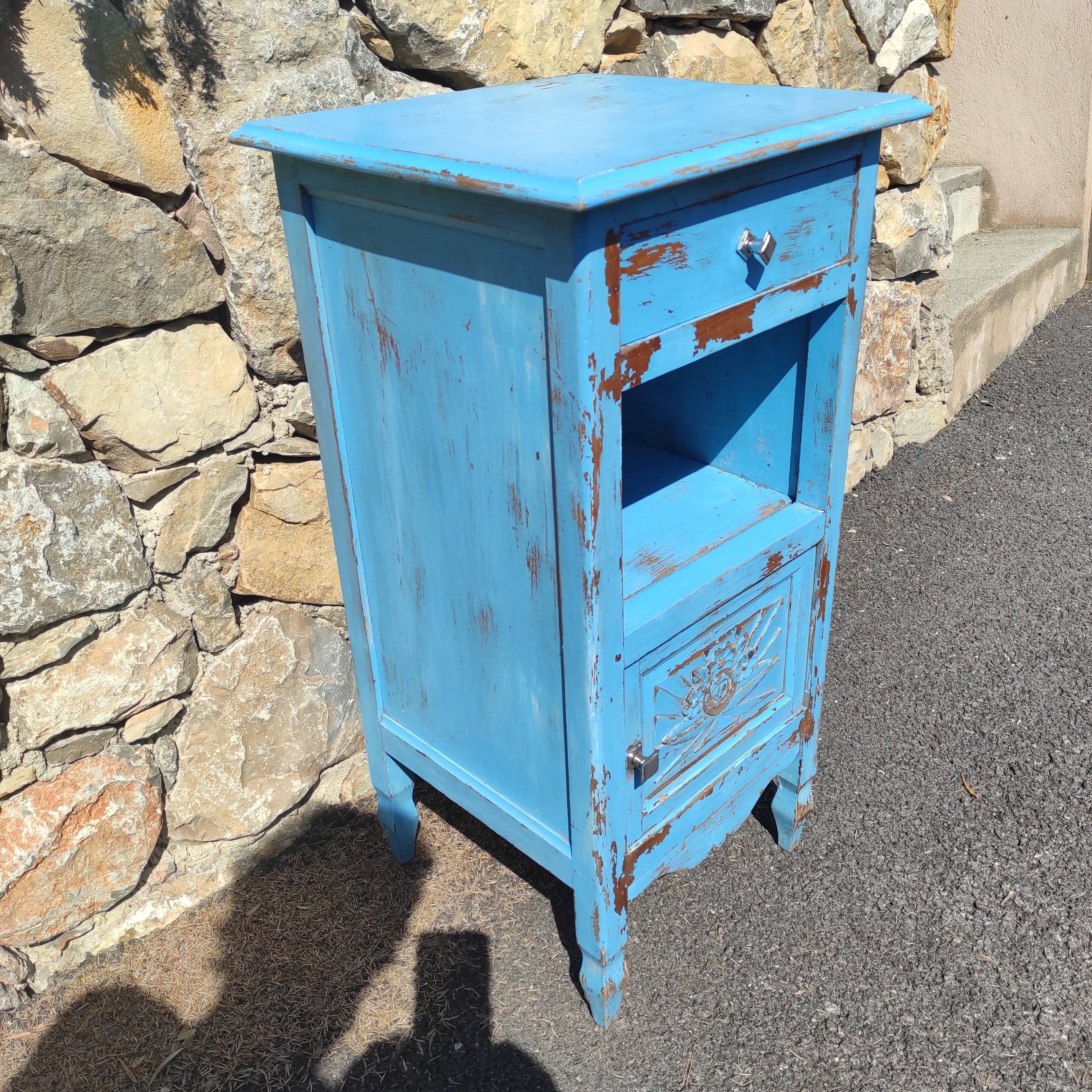 Old bedside table with 1 drawer and 1 door painted in lavender blue