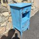 Old bedside table with 1 drawer and 1 door painted in lavender blue
