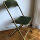 Set of three vintage green folding chairs