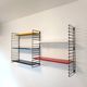Tomado wall unit with metal shelves by A. Dekker