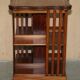 Sheraton-style rotating library table in walnut and satinwood.