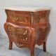 Commode galbée de style Louis XV en marqueterie