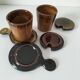Pair of glazed stoneware cups with saucers and lids