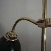 Desk lamp in brass with a swan neck and green opaline glass.