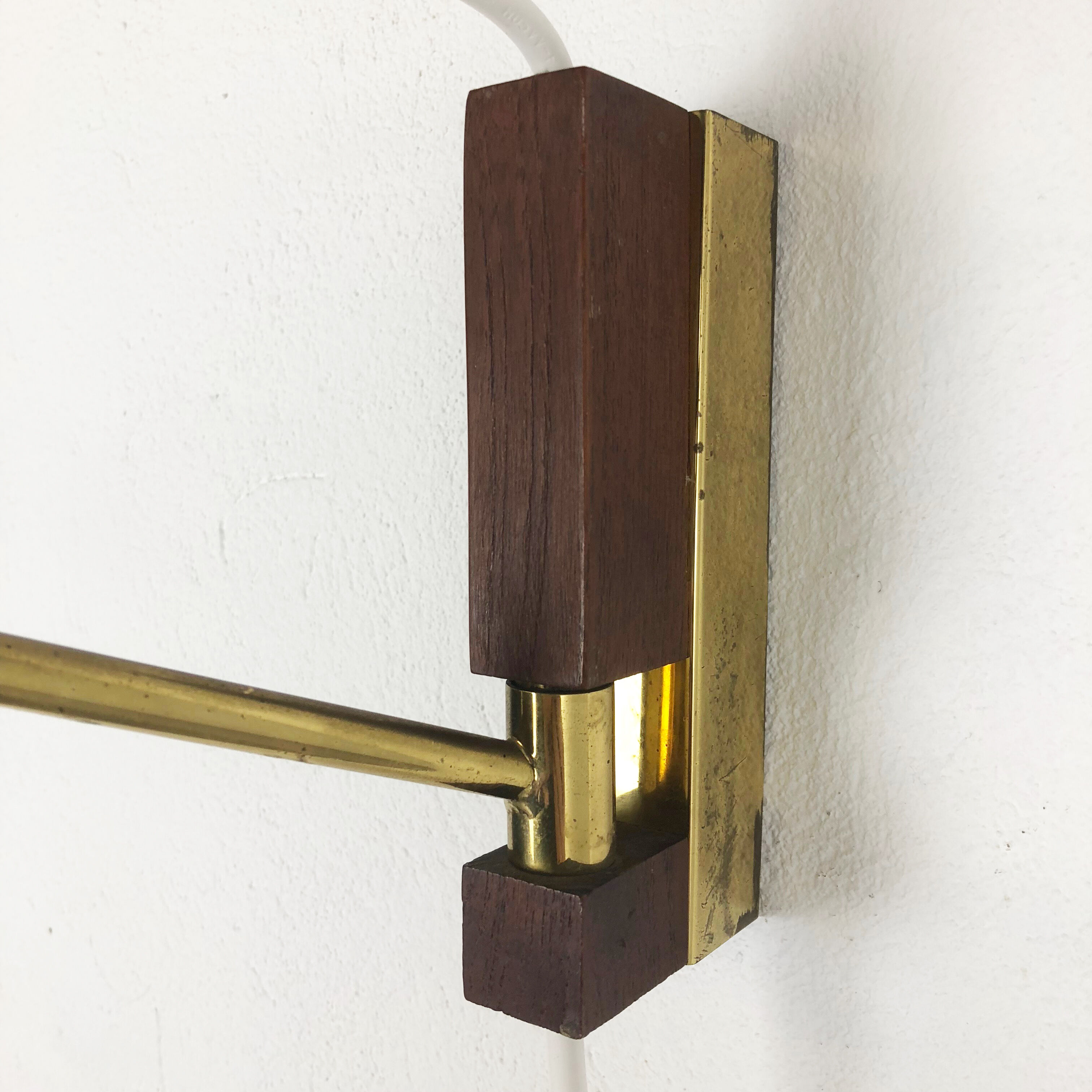 Danish brass and teak wall light, Denmark, 1960s