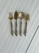Set de 4 couverts de service anciens