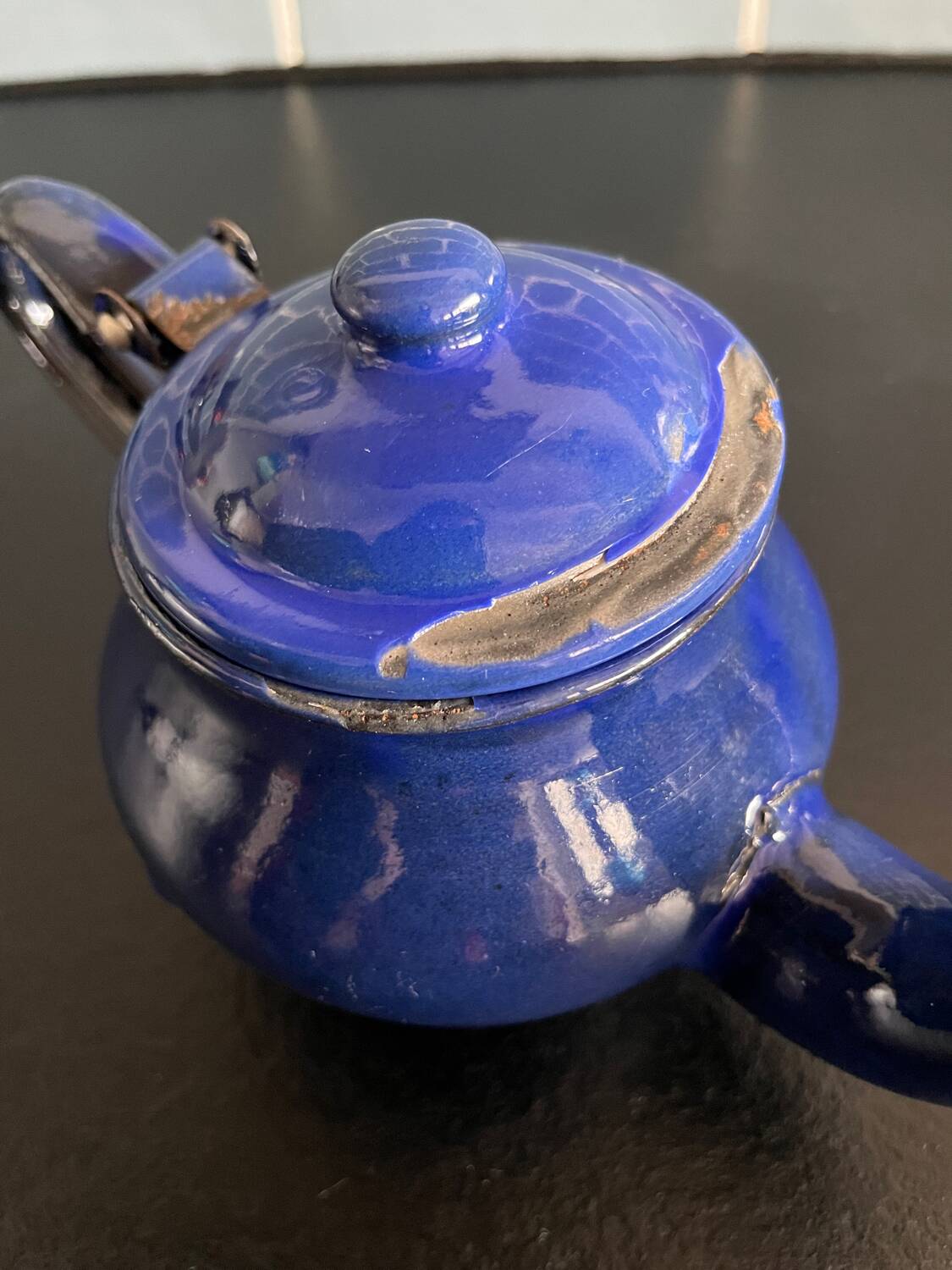 Mini blue enamelled sheet metal teapot