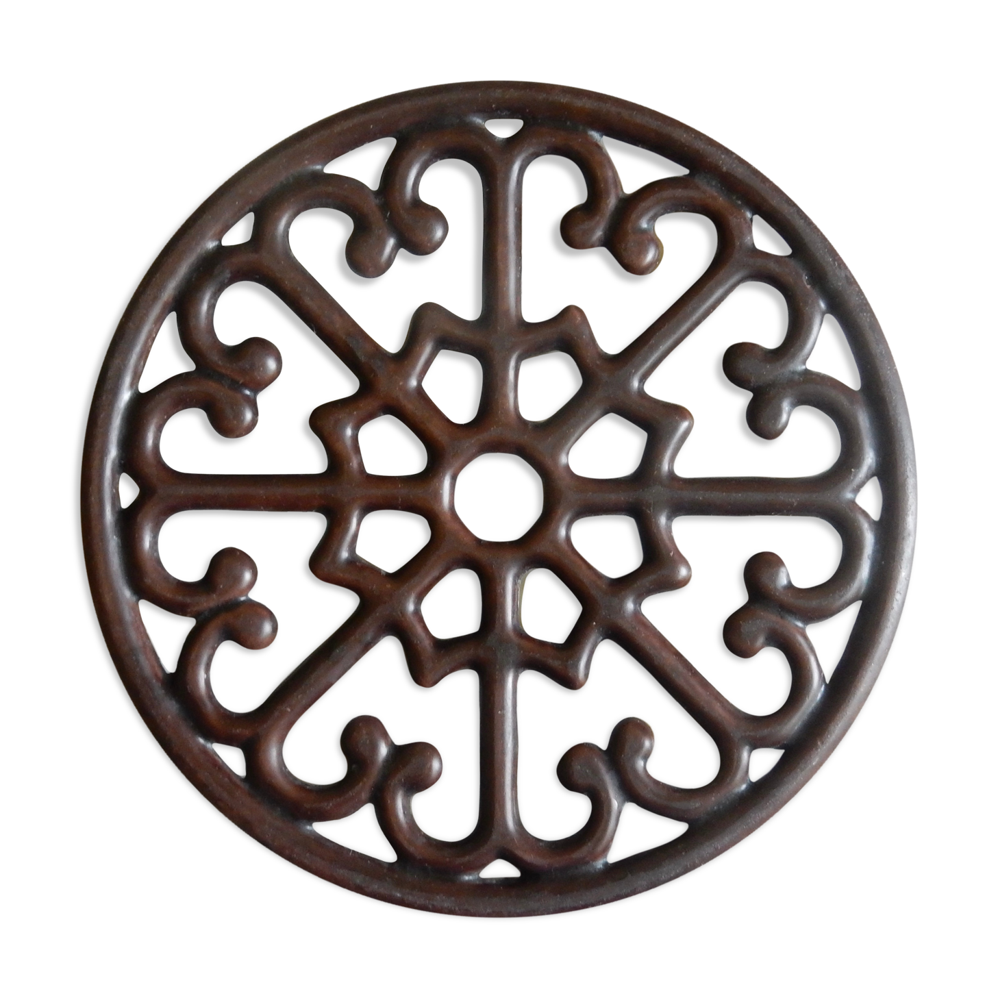 Brown enamelled cast iron trivet