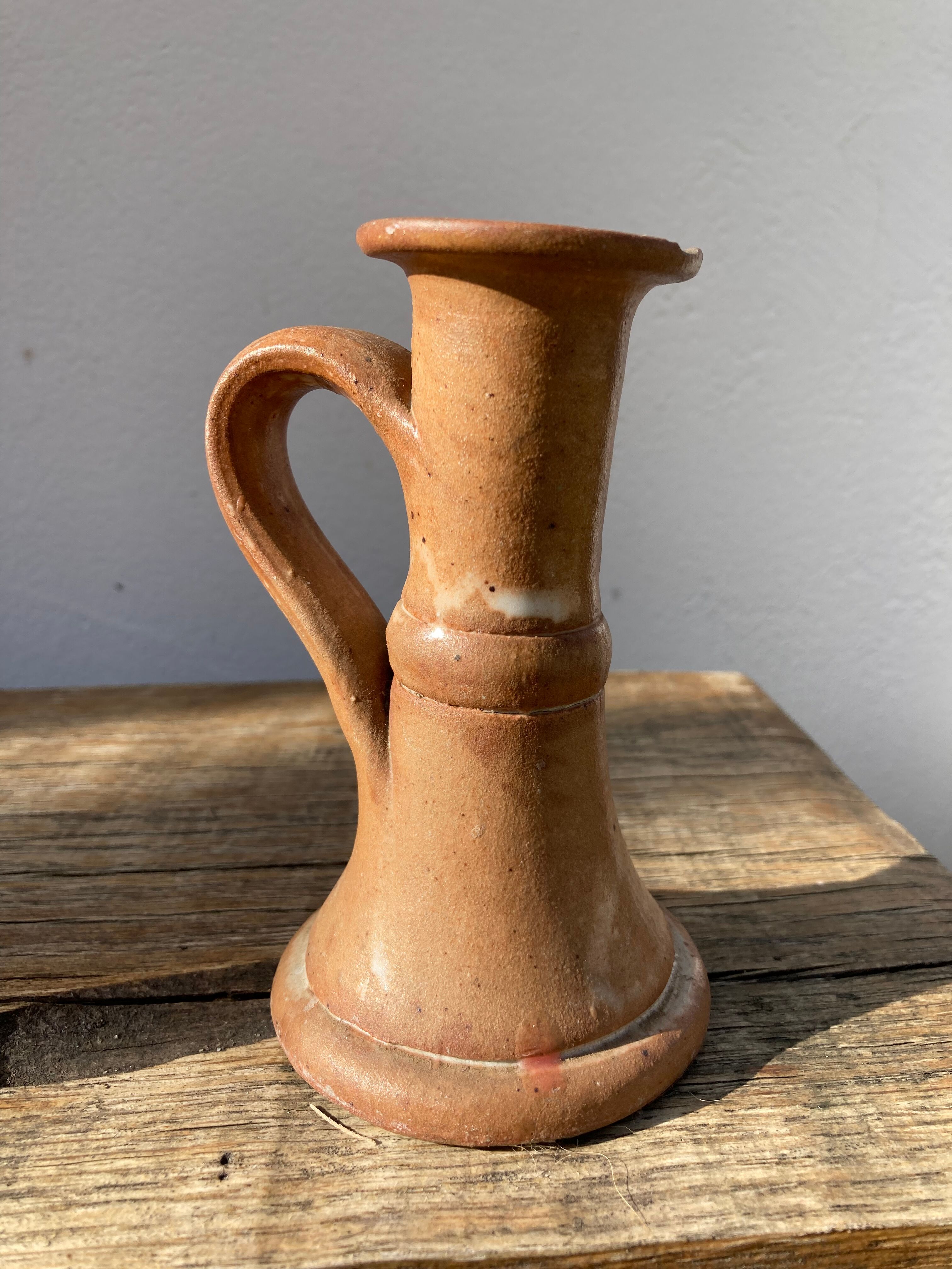 Candle holder in beige brown enamelled sandstone
