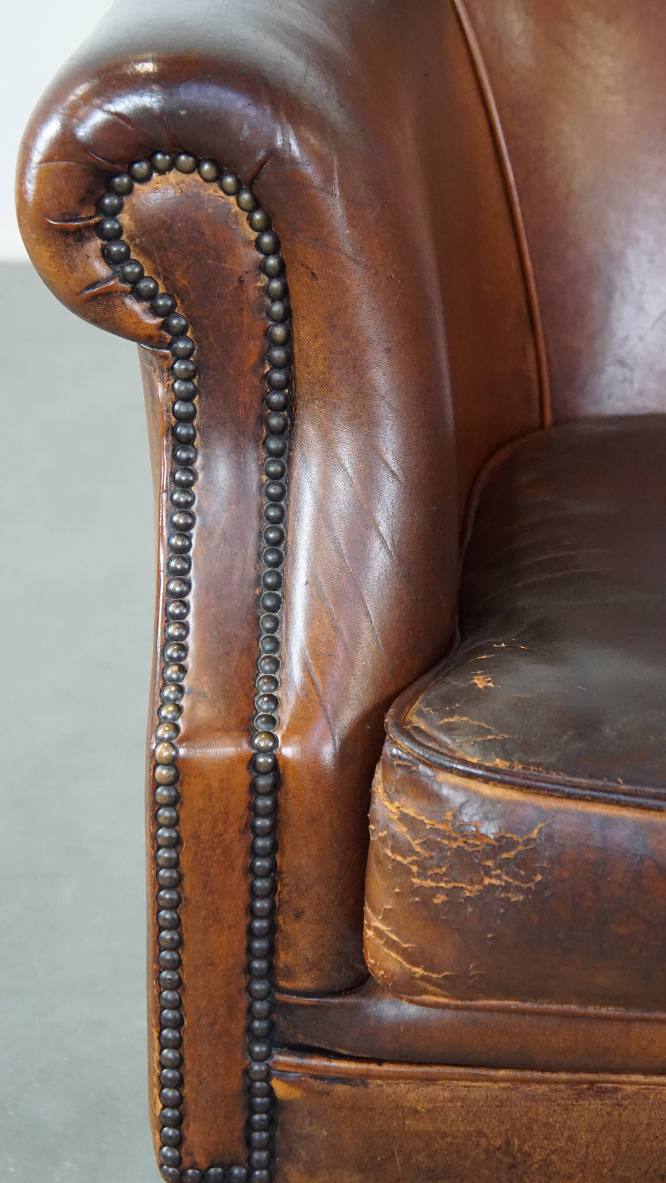 Vintage club armchair in sheepskin leather