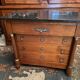 Chest of drawers with columns in blond walnut Empire style XIXth